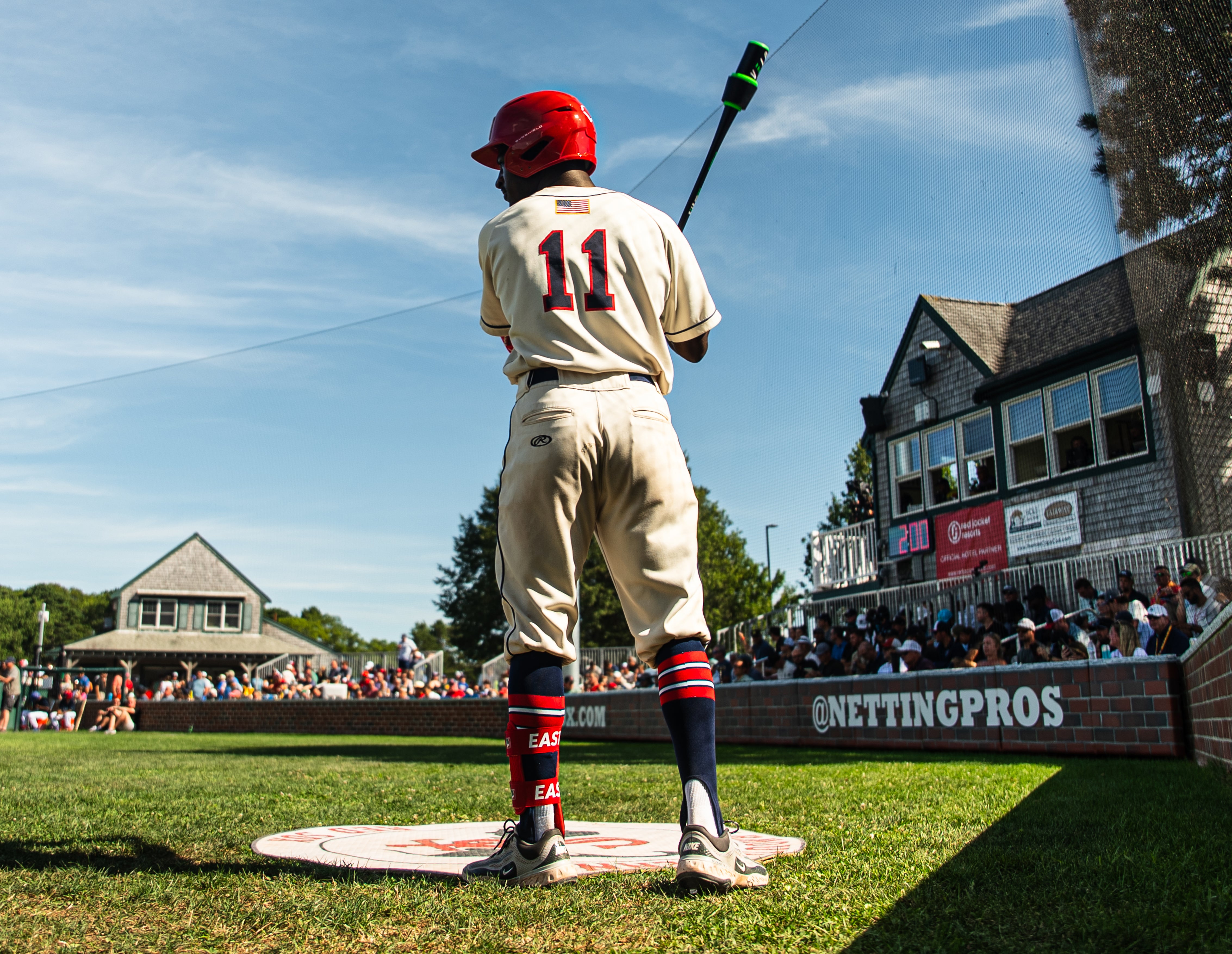 Dee Kennedy, Kansas State, waiting in on-deck circle before his at bat looking intently at pitcher