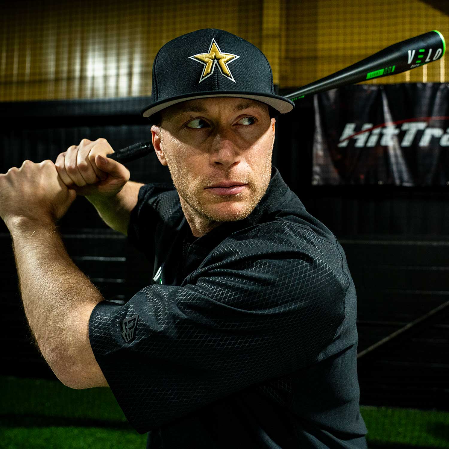 Player and coach, Matt Antonelli, posing with black Pro VELO Overspeed bat