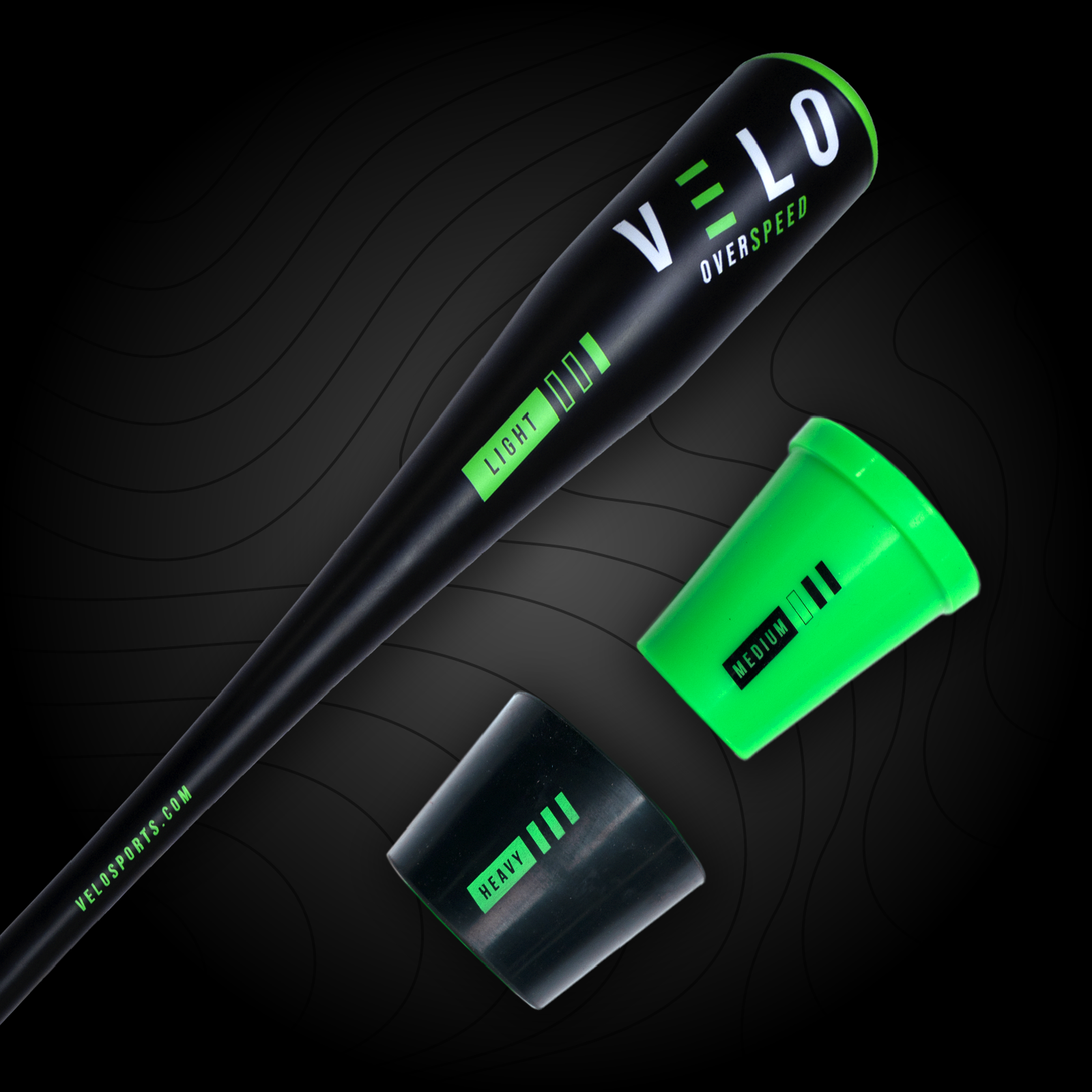 A black and green VELO Overspeed baseball training bat with the brand name 'VELO' written on it, alongside medium green weight and heavy black weight.